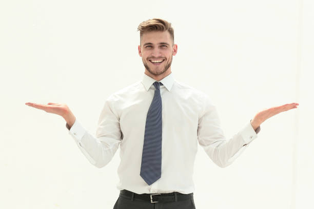 istock Charming businessman stretching out his palms with empty space 1022106330