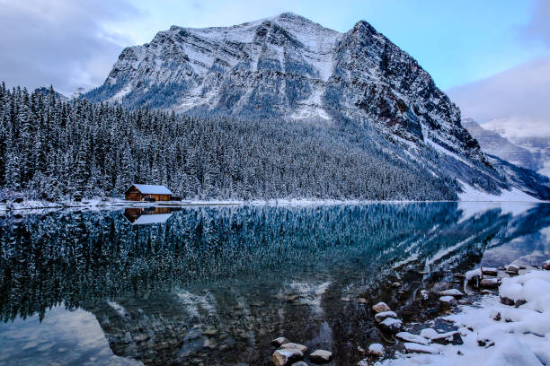 istock Log hut on the Lake Louise, Canada 1022109374