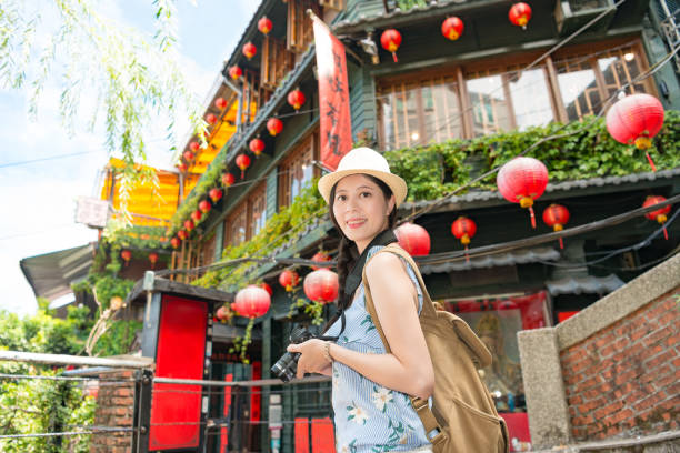 istock tourist taking photo with a DSLR camera 1022110412