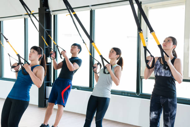 istock TRX total body resistance exercises trainer 1022112972