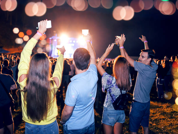 istock Friends enjoying a concert 1022121872