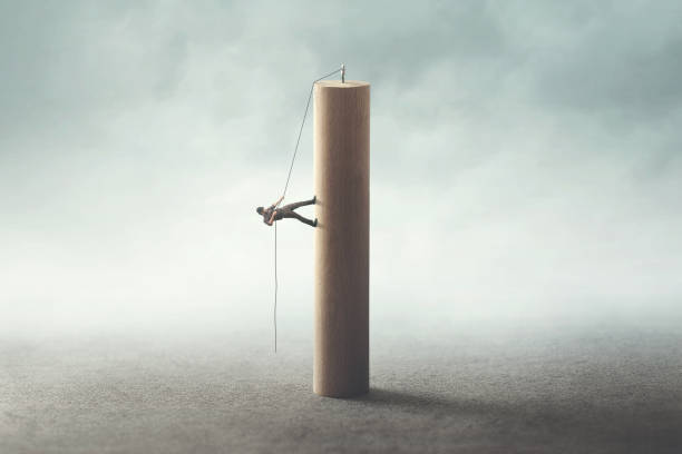 istock man climbing the tower with a rope 1022128162