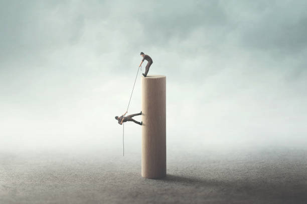 istock business teamwork concept; man help friend 1022130226