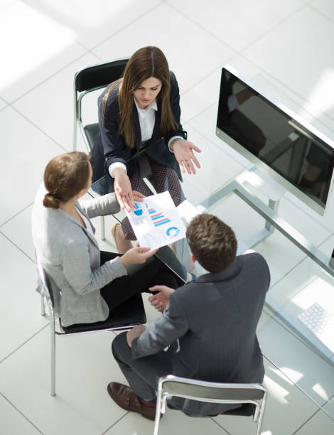 istock top view.business team discussing new business plan 1022131210
