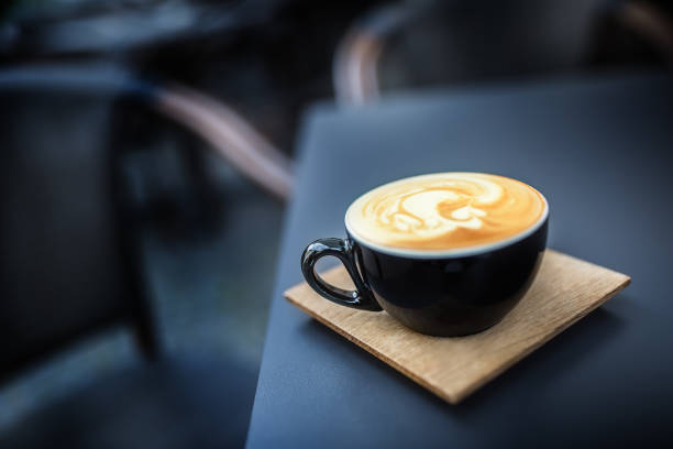 istock Coffee and latte art on table terrace in restaurant. 1022133688