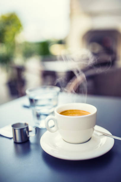 istock Cup of coffee on table in restaurant terrace. 1022133692