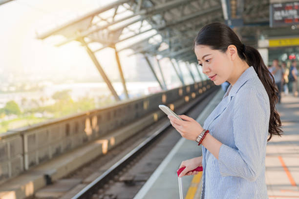 istock business woman using the mobile smartphone 1022134766