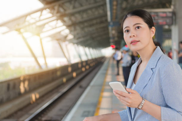 istock young woman waiting for high speed rail 1022134830