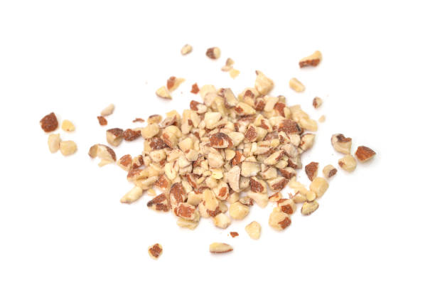 istock Diced Almond on white background 1022140918
