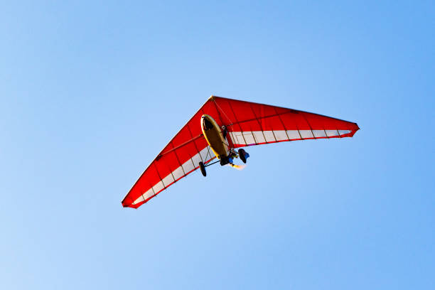 istock Flight of the motor deltaplane in the sky. 1022144890