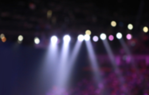 Blur of concert lighting on stage.