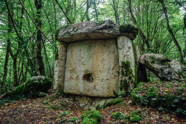 istock Ancient mysterious megalithic construction dolmen in Abkhazian forest 1022158976