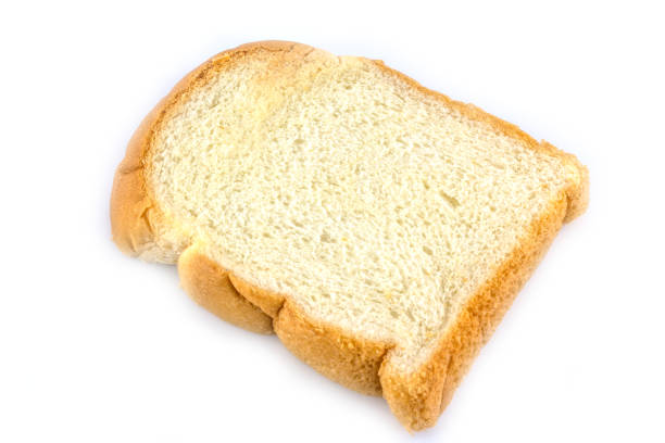 istock Slice of white bread isolated on white 1022159540