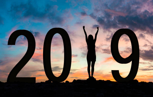 istock Woman enjoying on the hill and 2019 years while celebrating new year 1022166322