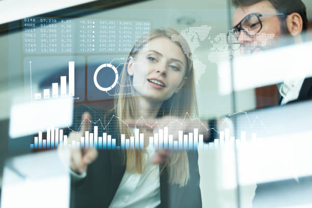 istock Busines couple discussing business profit on a modern interface 1022167756