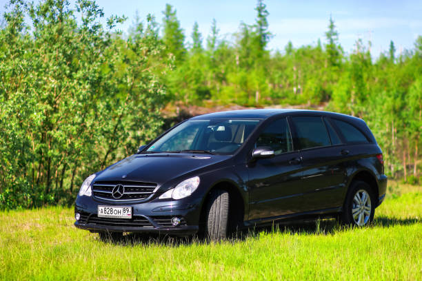 Novyy Urengoy, Russia - June 27, 2018: Black motor car Mercedes-Benz W251 R350 at the countryside.