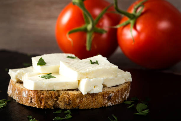 Open sandwich with telemea cheese stock photo
