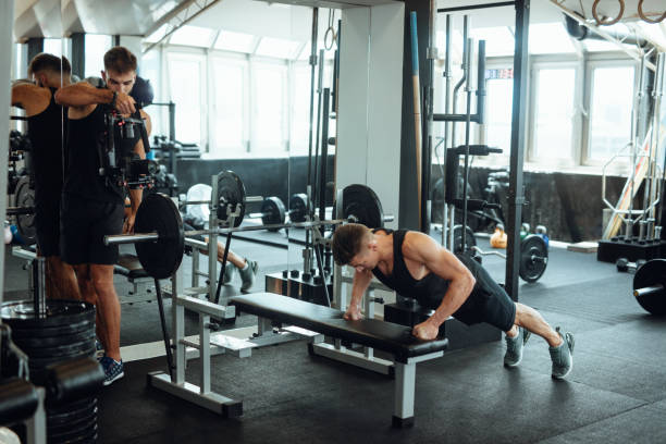 istock Personal trainer filming work out for social media 1022175228