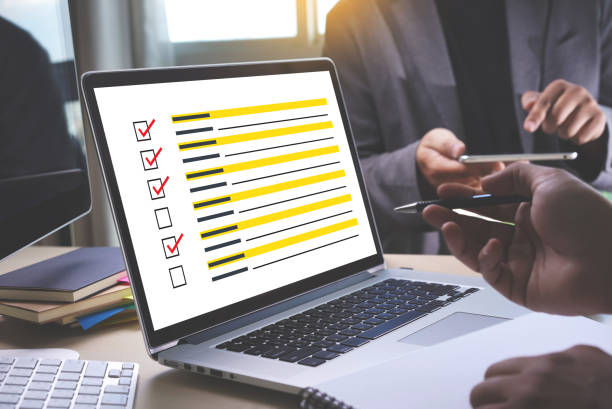 istock businessman SURVEY and Results Analysis Discovery Concept 1022179116