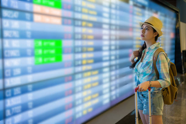istock Young woman look at flight timetable worries 1022191282