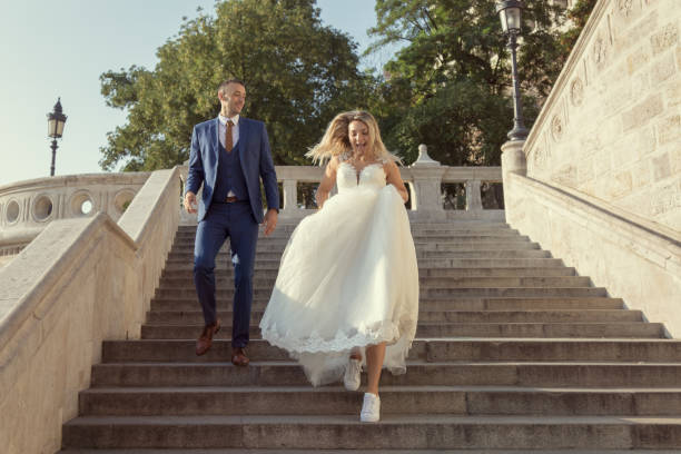 istock young happy romantic wedding couple outdoors in city 1022197738