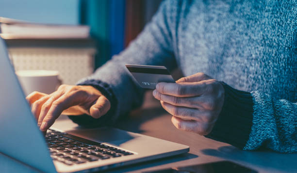 istock Man online banking at home 1022207636