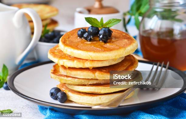 Homemade Vanilla Punkcakes With Syrup And Blueberries For Breakfast Good Morning Stock Photo - Download Image Now