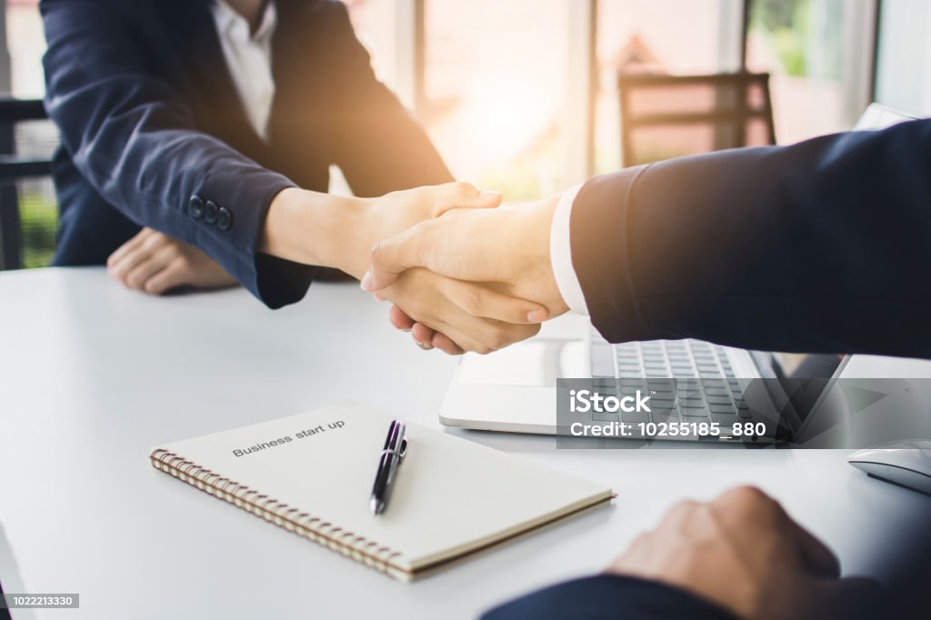 start up business people shake hands with investor before negotiating and planning to invest company together start up business people shake hands with investor before negotiating and planning to invest company together in office Handshake Stock Photo