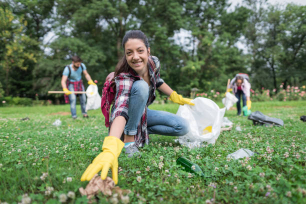 istock Woman cleaning the community park 1022219452