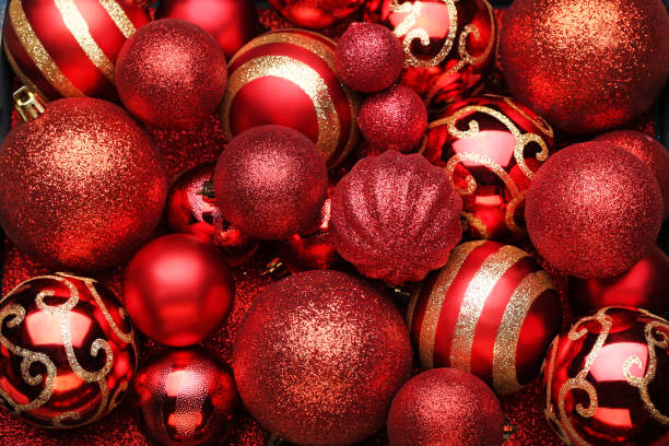 Red christmas baubles background stock photo