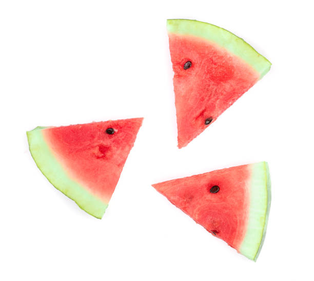 istock slices of watermelon isolated on white background. Top view. Flat lay pattern 1022225434