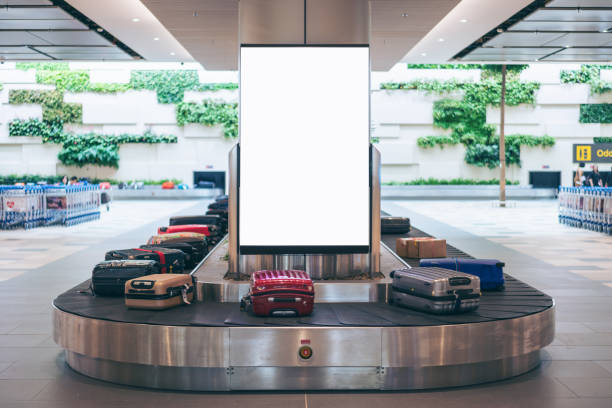 blank advertising billboard with baggage and luggage in the international airport - outdoor chair imagens e fotografias de stock