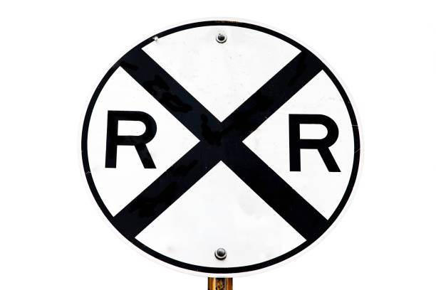 St. Andrew's Cross with warning lamp at a level crossing