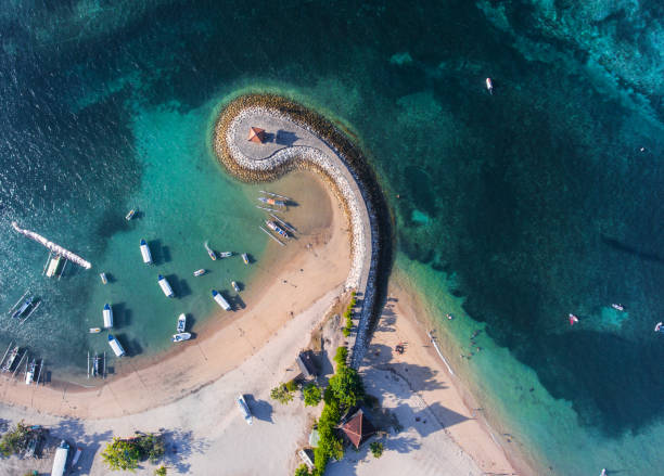 istock Bali coast with a figurative breakwater aerial view 1022237312