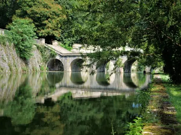 This old stone bridge is in a park at Châteauneuf-sur-Loire, Loire valley.
