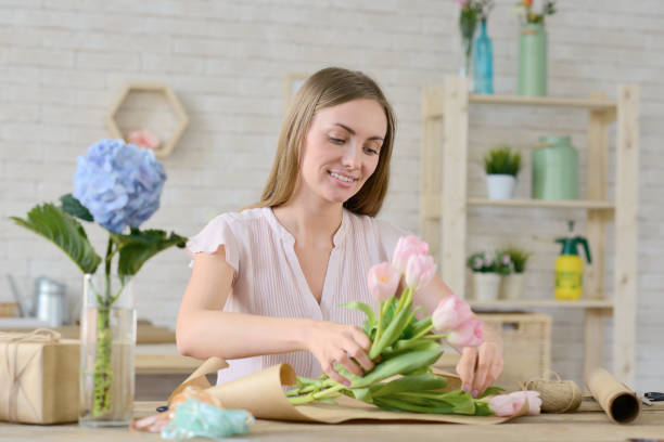 istock Beautiful Florist Arranging Bouquet 1022243350