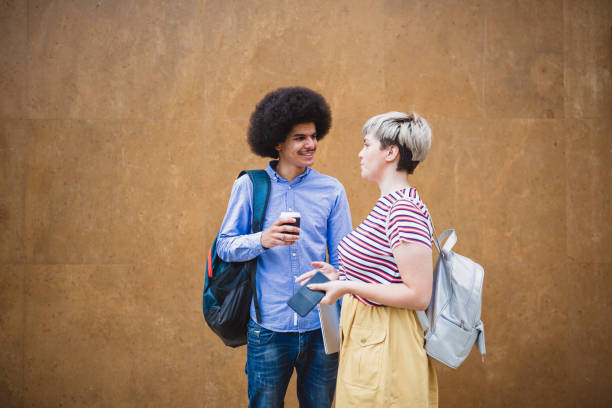 istock Students talking on the street after class 1022246030