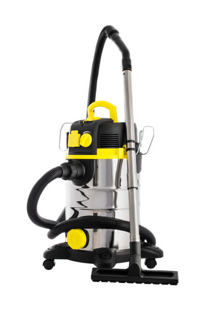 Vacuum cleaner isolated on white. Professional cleaning machine for wet and dry floors Vacuum cleaner isolated on white. Professional cleaning machine for wet and dry floors carpet factory photos stock pictures, royalty-free photos & images