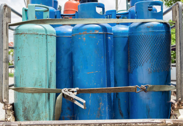 istock Liquid gas blue green old tanks carry on pickup 1022254868
