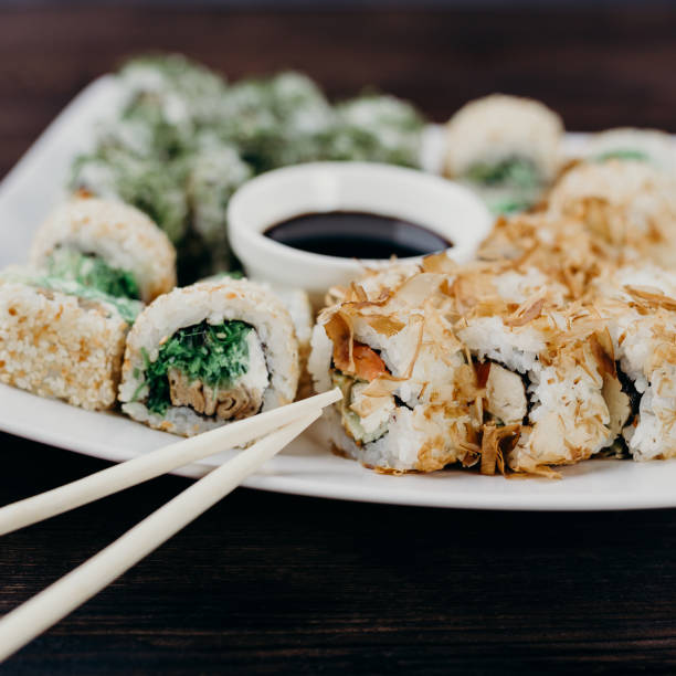 istock Japanese sushi plate with sauce and chopsticks 1022256160