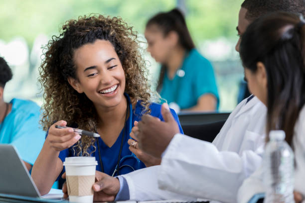 istock Young medical student enjoys discussion with colleague 1022278024
