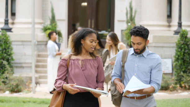 istock College friends walking on campus 1022278258
