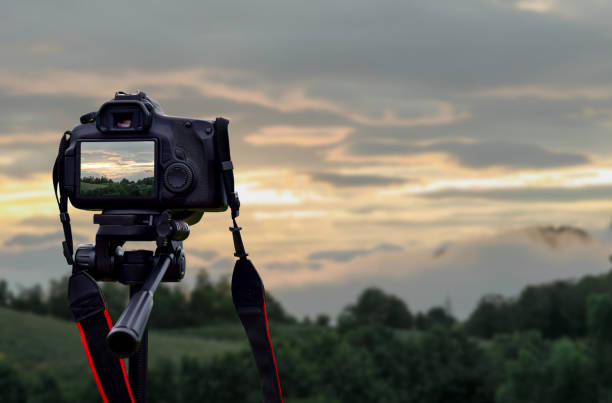 istock Camera on tripod photographers take scenic views. 1022278898
