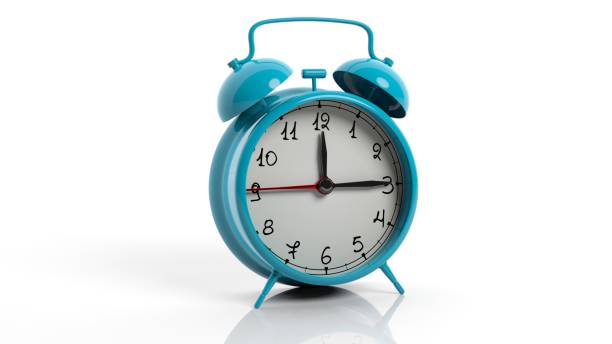 istock Retro blue alarm clock, isolated on white background. 1022284628