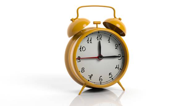 istock Retro orange alarm clock, isolated on white background. 1022286588