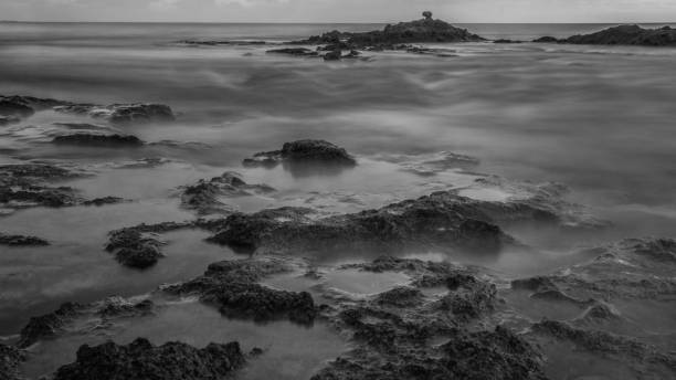 istock Long exposure sunset on Palmahim rocky Beach- Israel 1022295406