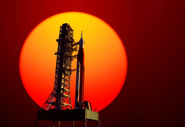 istock Space Launch System On Launchpad On Background Of Red Sun 1022301432