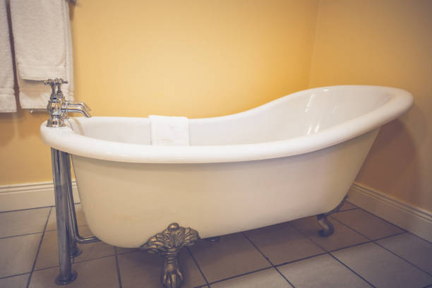 istock Vintage bathtub in a washbasin 1022308106