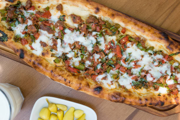 istock Turkish Pide with Minced Meat Kavurma Salad and Pickles. 1022312600