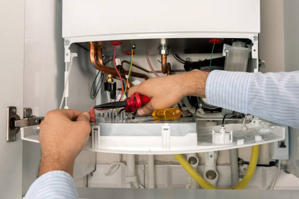 istock Technician repairing combi Gas Boiler 1022313512